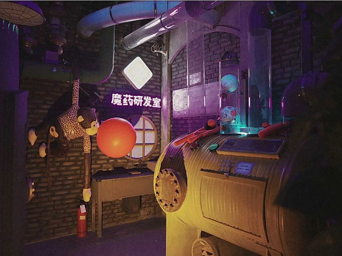A wonder-lit workshop deep inside AURORA, in pink and violet light.