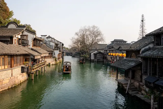 A canal running between old houses in one of the water towns outside Shanghai